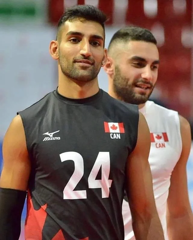 Irvan Brar wearing a Team Canada jersey with the Canadian flag crest